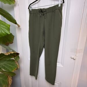 Lululemon On the Fly Pant Olive Green Womens Size 8 Straight Leg Active